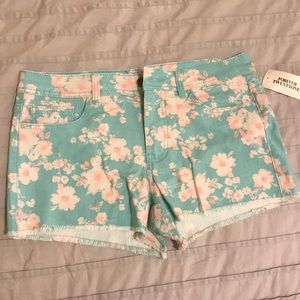 High-rise aqua and neon pink floral shorts